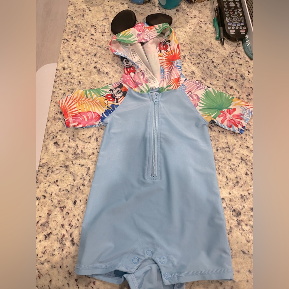ShopDisney baby wet suit. Mickey/tropical 9-12M. Only work a couple of times